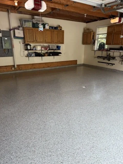 Finished epoxy flake floor in a residential garage